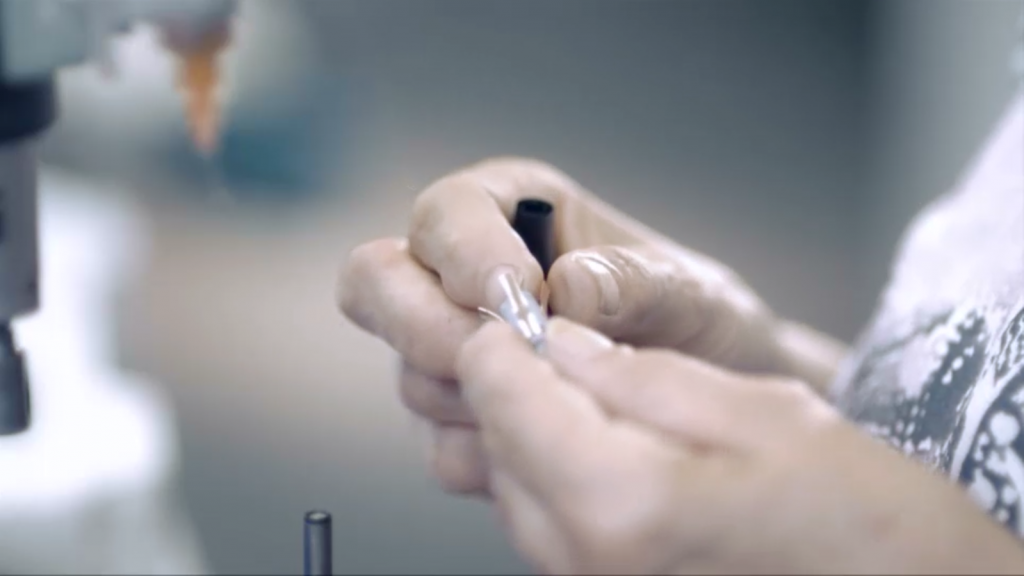 the finer stages of pen assembly are carried out by hand